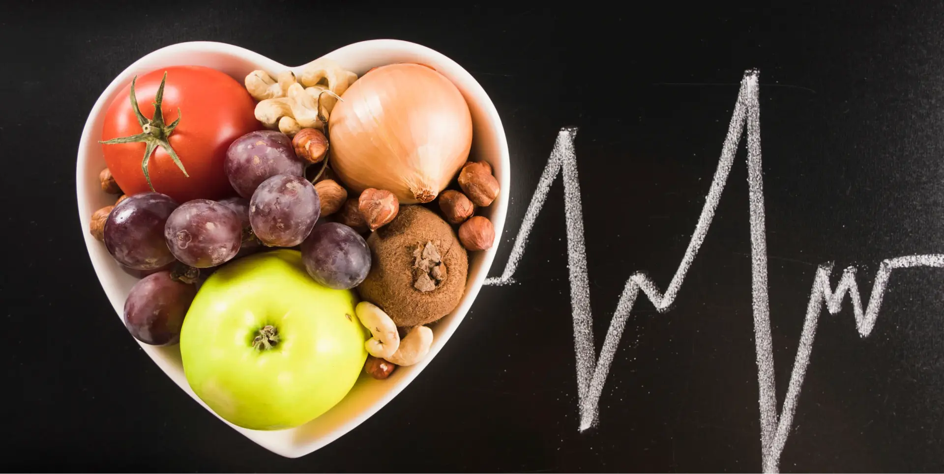 healthy-food-heart-shape-container-with-chalk-drawn-heart-pulse-blackboard 1